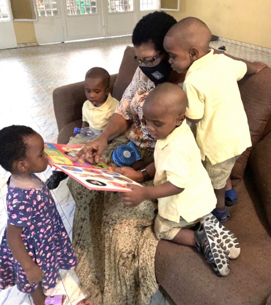 A group of children gathering around for story time